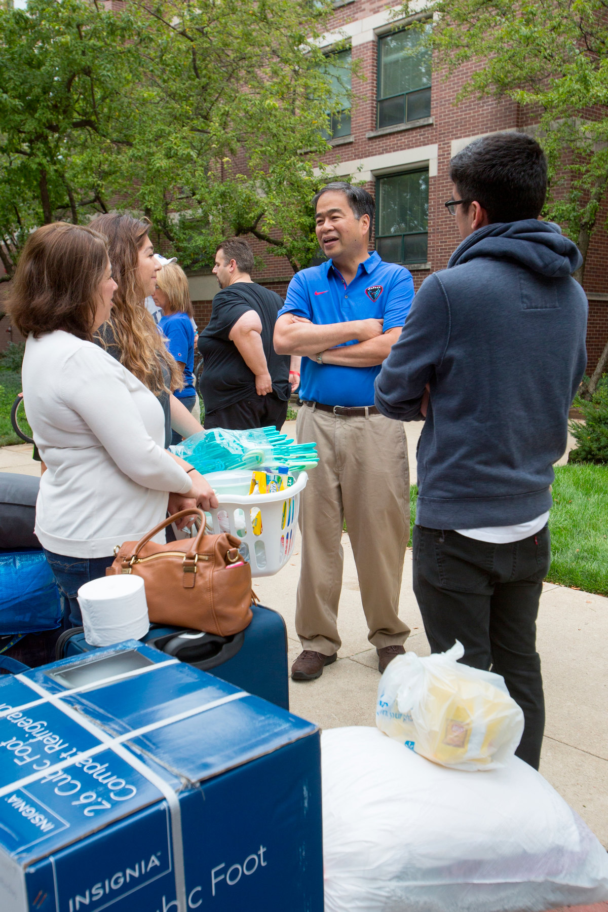 Esteban greets students during Move-In